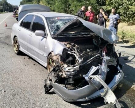 Серый Мицубиси Лансер, объемом двигателя 2 л и пробегом 200 тыс. км за 1500 $, фото 2 на Automoto.ua