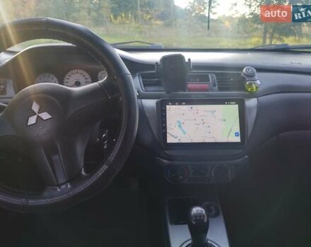 Серый Мицубиси Лансер, объемом двигателя 1.58 л и пробегом 250 тыс. км за 4700 $, фото 16 на Automoto.ua