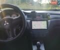 Серый Мицубиси Лансер, объемом двигателя 1.58 л и пробегом 250 тыс. км за 4700 $, фото 16 на Automoto.ua