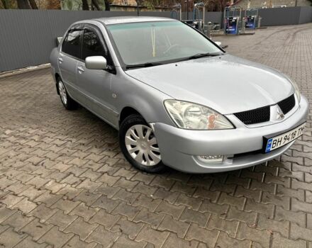 Серый Мицубиси Лансер, объемом двигателя 1.6 л и пробегом 260 тыс. км за 4999 $, фото 2 на Automoto.ua