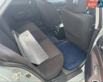 Сірий Міцубісі Lancer, об'ємом двигуна 2 л та пробігом 263 тис. км за 4300 $, фото 7 на Automoto.ua