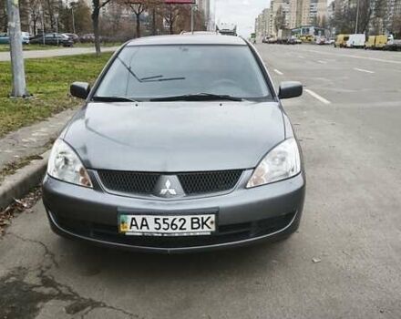 Серый Мицубиси Лансер, объемом двигателя 1.6 л и пробегом 263 тыс. км за 3650 $, фото 8 на Automoto.ua