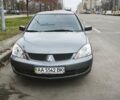 Серый Мицубиси Лансер, объемом двигателя 1.6 л и пробегом 263 тыс. км за 3650 $, фото 8 на Automoto.ua