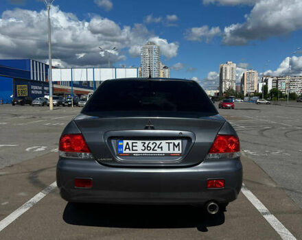 Сірий Міцубісі Lancer, об'ємом двигуна 1.6 л та пробігом 223 тис. км за 4500 $, фото 2 на Automoto.ua