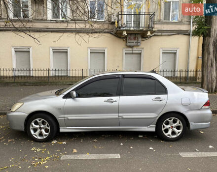 Серый Мицубиси Лансер, объемом двигателя 1.6 л и пробегом 444 тыс. км за 3400 $, фото 3 на Automoto.ua