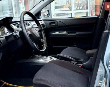 Сірий Міцубісі Lancer, об'ємом двигуна 1.58 л та пробігом 275 тис. км за 4600 $, фото 13 на Automoto.ua