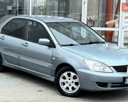 Сірий Міцубісі Lancer, об'ємом двигуна 1.58 л та пробігом 275 тис. км за 4600 $, фото 6 на Automoto.ua