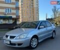 Серый Мицубиси Лансер, объемом двигателя 1.6 л и пробегом 232 тыс. км за 4600 $, фото 1 на Automoto.ua