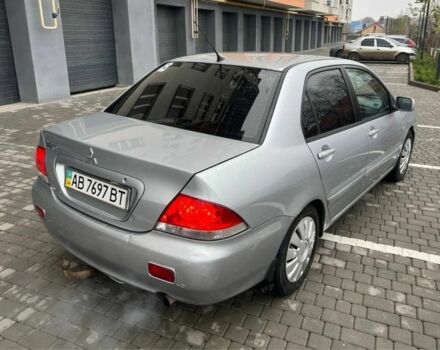 Серый Мицубиси Лансер, объемом двигателя 1.6 л и пробегом 333 тыс. км за 2800 $, фото 7 на Automoto.ua