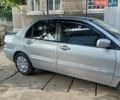 Серый Мицубиси Лансер, объемом двигателя 1.6 л и пробегом 188 тыс. км за 4450 $, фото 1 на Automoto.ua