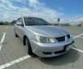 Сірий Міцубісі Lancer, об'ємом двигуна 1.6 л та пробігом 294 тис. км за 5300 $, фото 1 на Automoto.ua