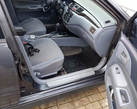 Сірий Міцубісі Lancer, об'ємом двигуна 2 л та пробігом 212 тис. км за 3333 $, фото 7 на Automoto.ua