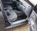 Сірий Міцубісі Lancer, об'ємом двигуна 2 л та пробігом 212 тис. км за 3333 $, фото 7 на Automoto.ua