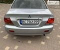 Сірий Міцубісі Lancer, об'ємом двигуна 1.58 л та пробігом 300 тис. км за 3600 $, фото 9 на Automoto.ua