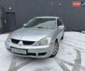 Сірий Міцубісі Lancer, об'ємом двигуна 1.58 л та пробігом 291 тис. км за 3000 $, фото 1 на Automoto.ua