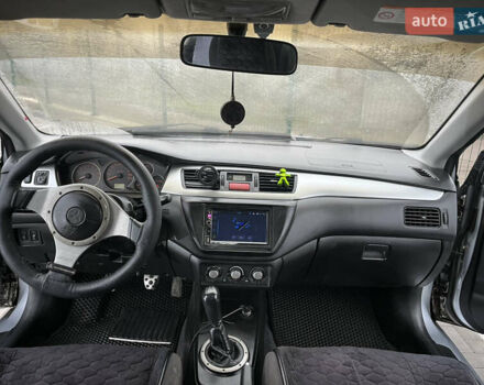 Сірий Міцубісі Lancer, об'ємом двигуна 2 л та пробігом 187 тис. км за 4500 $, фото 19 на Automoto.ua