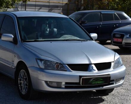 Серый Мицубиси Лансер, объемом двигателя 1.6 л и пробегом 230 тыс. км за 4550 $, фото 1 на Automoto.ua