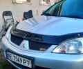 Сірий Міцубісі Lancer, об'ємом двигуна 1.6 л та пробігом 237 тис. км за 5000 $, фото 4 на Automoto.ua