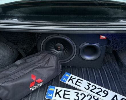 Серый Мицубиси Лансер, объемом двигателя 2 л и пробегом 256 тыс. км за 7000 $, фото 4 на Automoto.ua