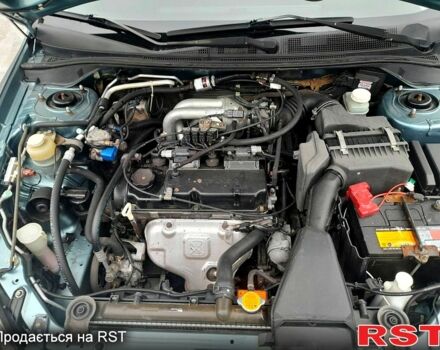 Сірий Міцубісі Lancer, об'ємом двигуна 1.6 л та пробігом 225 тис. км за 4650 $, фото 11 на Automoto.ua