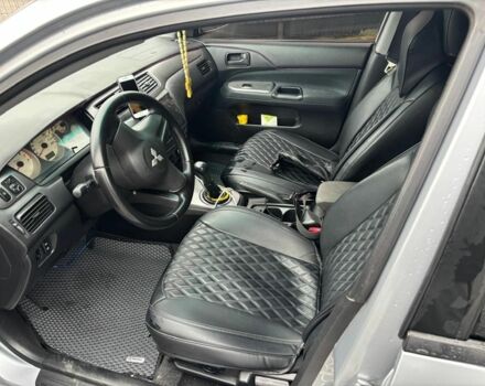 Серый Мицубиси Лансер, объемом двигателя 1.6 л и пробегом 260 тыс. км за 4999 $, фото 5 на Automoto.ua