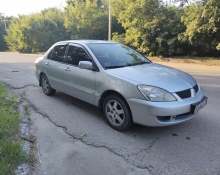 Сірий Міцубісі Lancer, об'ємом двигуна 1.6 л та пробігом 320 тис. км за 4299 $, фото 1 на Automoto.ua