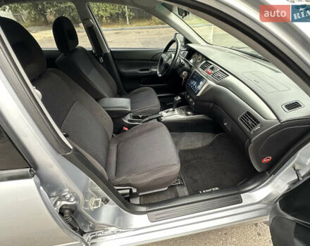 Серый Мицубиси Лансер, объемом двигателя 1.58 л и пробегом 183 тыс. км за 4800 $, фото 25 на Automoto.ua