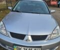 Сірий Міцубісі Lancer, об'ємом двигуна 1.6 л та пробігом 230 тис. км за 4500 $, фото 1 на Automoto.ua