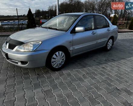 Сірий Міцубісі Lancer, об'ємом двигуна 1.58 л та пробігом 333 тис. км за 2700 $, фото 5 на Automoto.ua