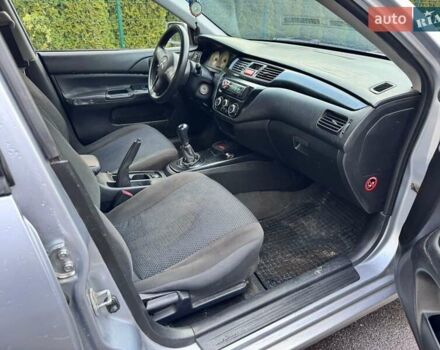 Серый Мицубиси Лансер, объемом двигателя 1.58 л и пробегом 333 тыс. км за 2950 $, фото 10 на Automoto.ua