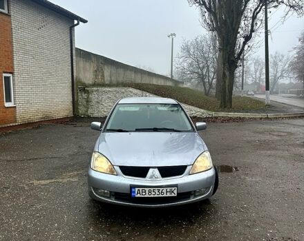 Серый Мицубиси Лансер, объемом двигателя 1.6 л и пробегом 123 тыс. км за 4000 $, фото 2 на Automoto.ua