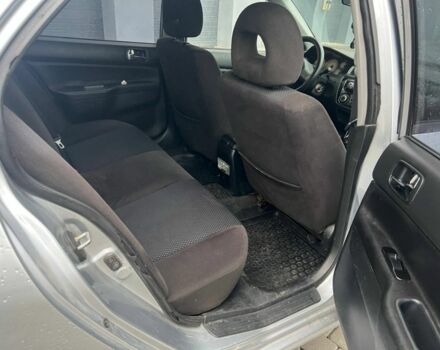 Серый Мицубиси Лансер, объемом двигателя 1.6 л и пробегом 333 тыс. км за 2800 $, фото 13 на Automoto.ua