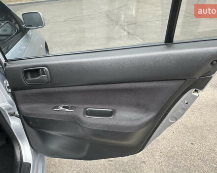 Серый Мицубиси Лансер, объемом двигателя 1.58 л и пробегом 183 тыс. км за 4800 $, фото 23 на Automoto.ua