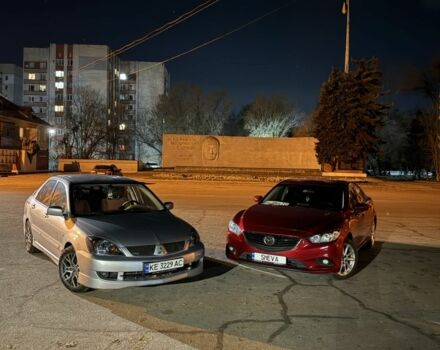 Серый Мицубиси Лансер, объемом двигателя 2 л и пробегом 256 тыс. км за 7000 $, фото 15 на Automoto.ua