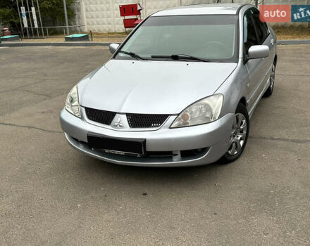 Серый Мицубиси Лансер, объемом двигателя 1.58 л и пробегом 183 тыс. км за 4800 $, фото 5 на Automoto.ua