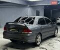 Серый Мицубиси Лансер, объемом двигателя 1.58 л и пробегом 300 тыс. км за 4600 $, фото 5 на Automoto.ua