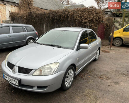 Сірий Міцубісі Lancer, об'ємом двигуна 1.58 л та пробігом 308 тис. км за 3700 $, фото 2 на Automoto.ua