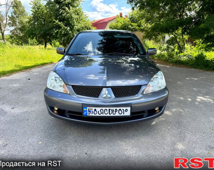 Серый Мицубиси Лансер, объемом двигателя 1.6 л и пробегом 188 тыс. км за 5490 $, фото 1 на Automoto.ua