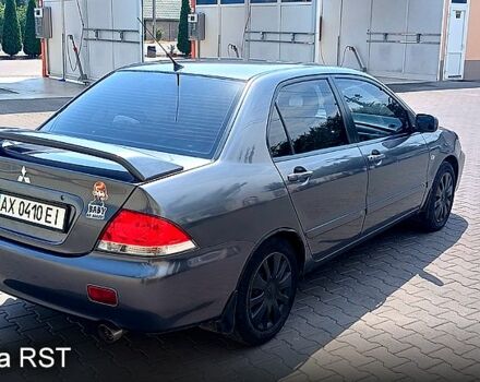 Сірий Міцубісі Lancer, об'ємом двигуна 1.6 л та пробігом 125 тис. км за 3850 $, фото 3 на Automoto.ua