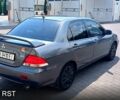 Сірий Міцубісі Lancer, об'ємом двигуна 1.6 л та пробігом 125 тис. км за 3850 $, фото 3 на Automoto.ua