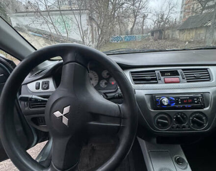 Сірий Міцубісі Lancer, об'ємом двигуна 1.6 л та пробігом 240 тис. км за 3000 $, фото 14 на Automoto.ua