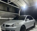 Сірий Міцубісі Lancer, об'ємом двигуна 1.6 л та пробігом 3 тис. км за 2600 $, фото 1 на Automoto.ua