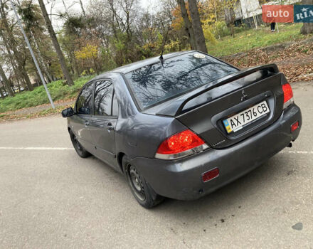 Сірий Міцубісі Lancer, об'ємом двигуна 1.6 л та пробігом 222 тис. км за 4900 $, фото 4 на Automoto.ua