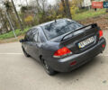 Сірий Міцубісі Lancer, об'ємом двигуна 1.6 л та пробігом 222 тис. км за 4900 $, фото 4 на Automoto.ua