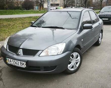 Серый Мицубиси Лансер, объемом двигателя 1.6 л и пробегом 263 тыс. км за 3650 $, фото 2 на Automoto.ua