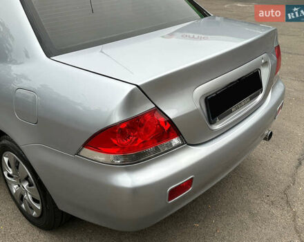 Серый Мицубиси Лансер, объемом двигателя 1.58 л и пробегом 183 тыс. км за 4800 $, фото 8 на Automoto.ua