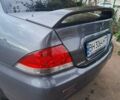 Сірий Міцубісі Lancer, об'ємом двигуна 1.6 л та пробігом 229 тис. км за 4900 $, фото 2 на Automoto.ua