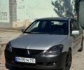 Серый Мицубиси Лансер, объемом двигателя 1.6 л и пробегом 274 тыс. км за 2909 $, фото 1 на Automoto.ua