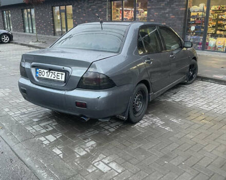 Сірий Міцубісі Lancer, об'ємом двигуна 1.6 л та пробігом 244 тис. км за 2999 $, фото 4 на Automoto.ua