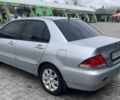 Сірий Міцубісі Lancer, об'ємом двигуна 0.16 л та пробігом 226 тис. км за 5400 $, фото 5 на Automoto.ua